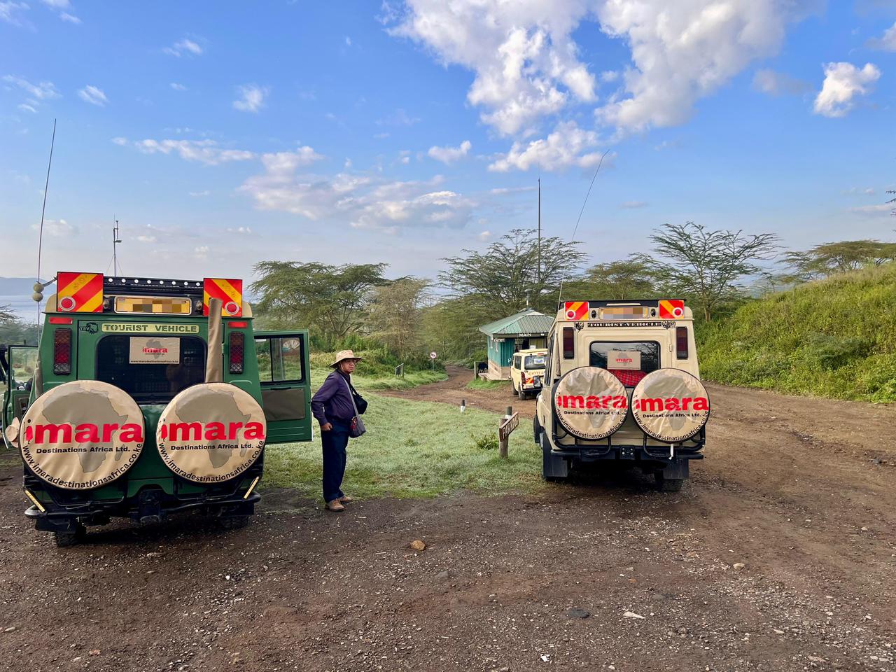 Imara Destinations Africa Landcruiser Vehichles at the entry gate of Lake Nakuru National Park with guests