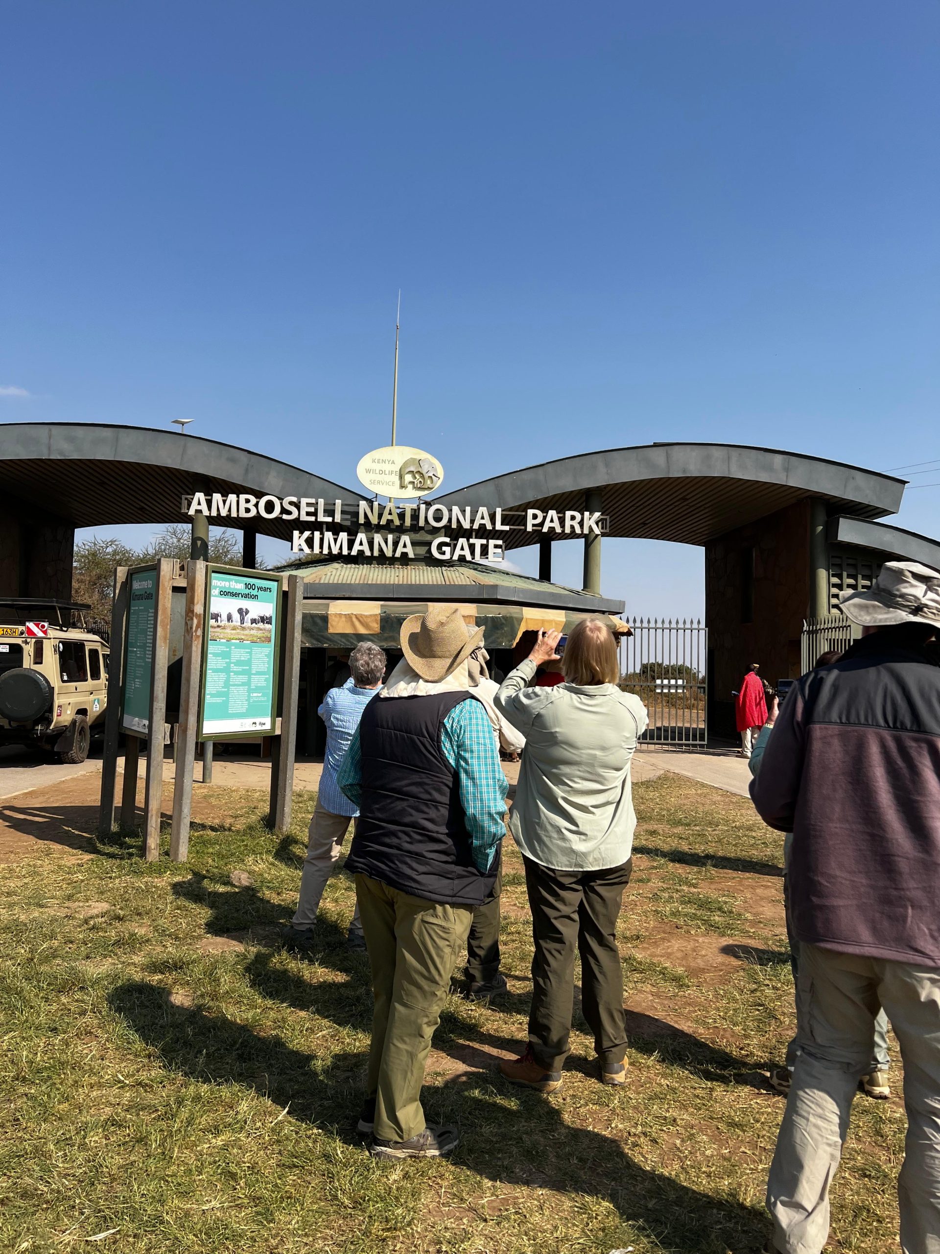 Our guests taking pictures at the entry gate of Amboseli National Park