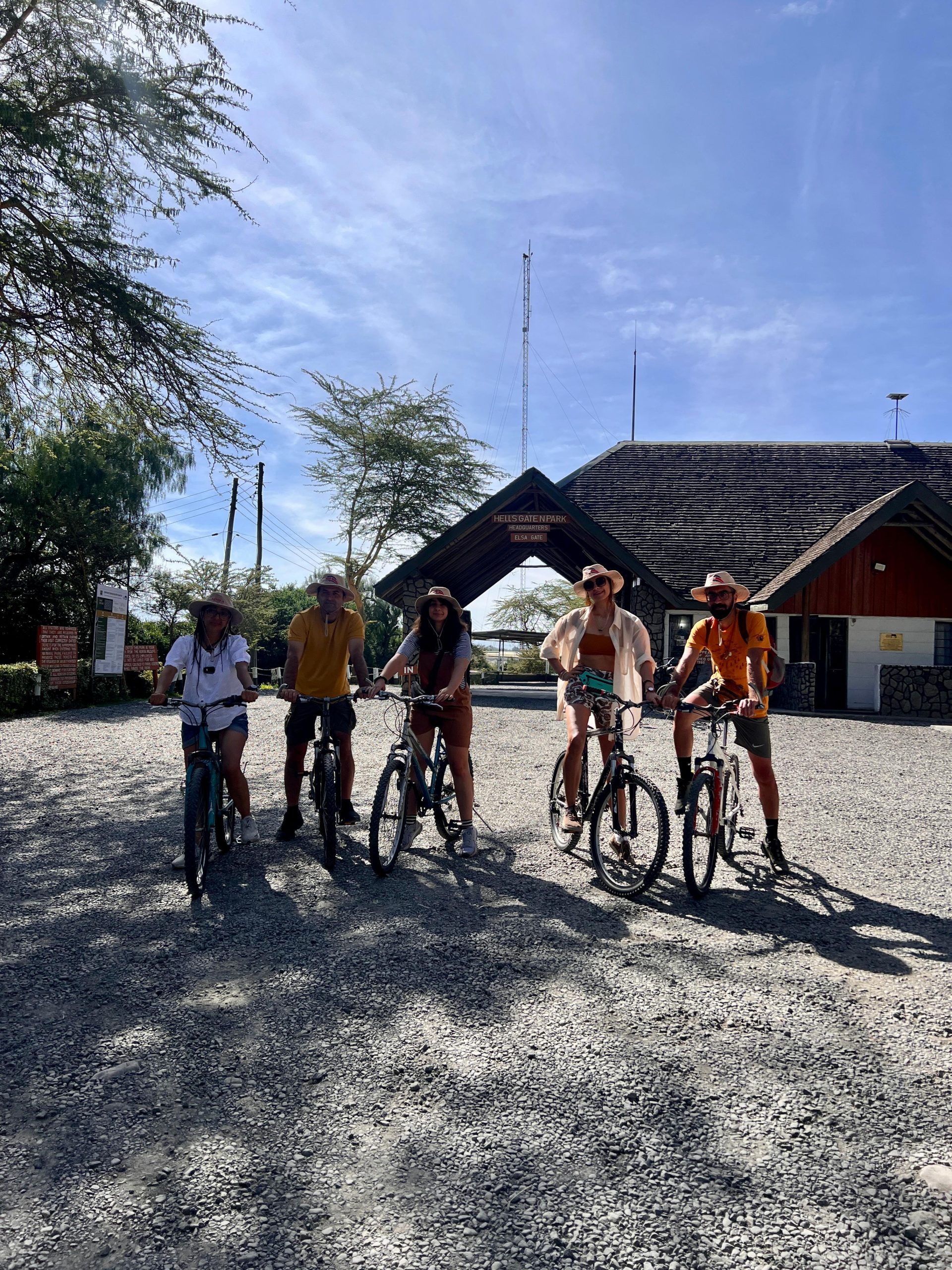 Our guests taking a picture in the entrance of Hell’s Gate National Park